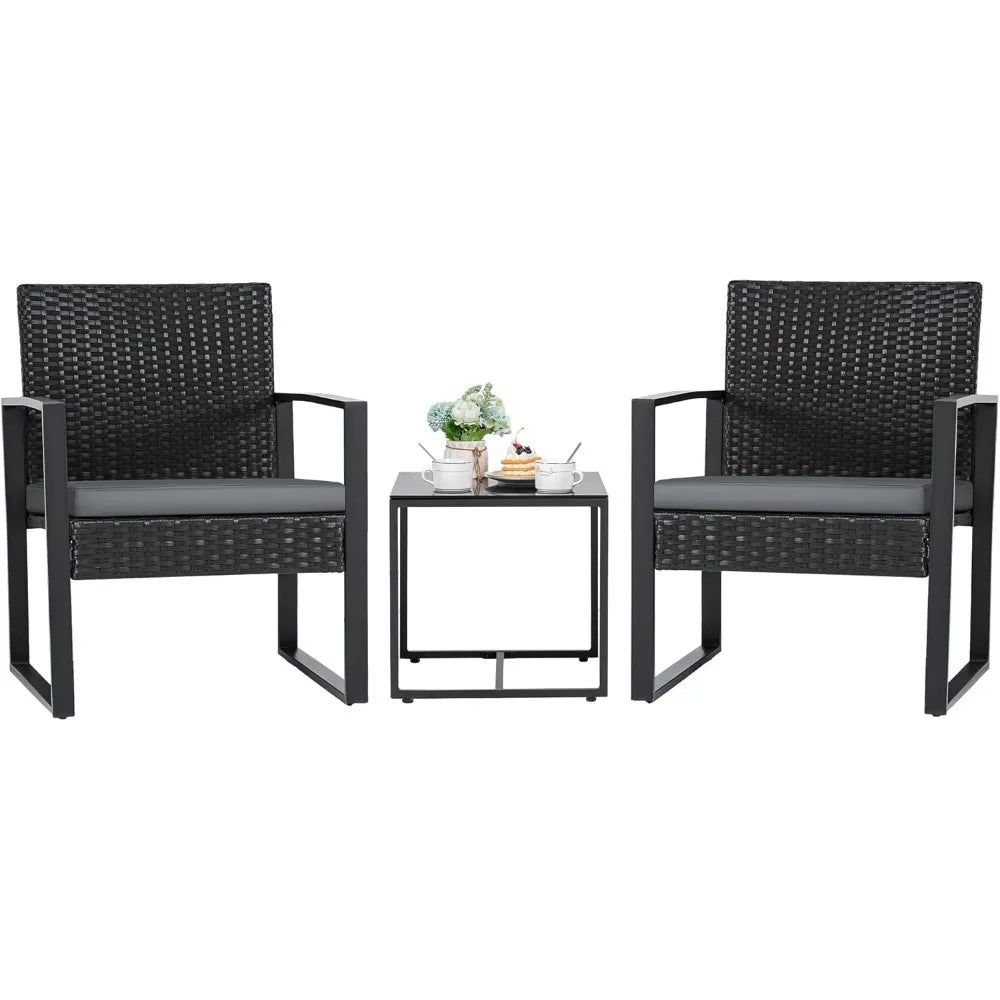 Outdoor Three Piece Wicker Patio Set With Glass Coffee Table