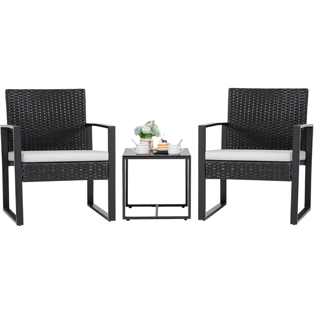 Outdoor Three Piece Wicker Patio Set With Glass Coffee Table