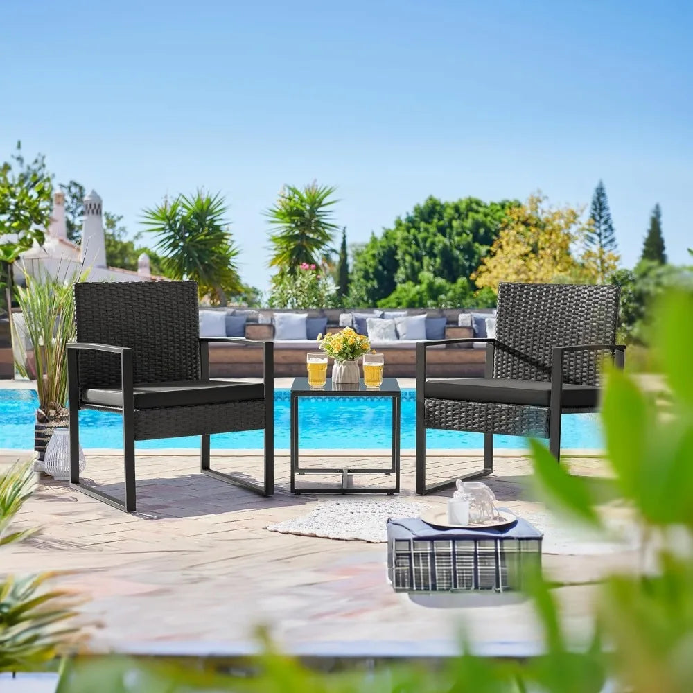 Outdoor Three Piece Wicker Patio Set With Glass Coffee Table
