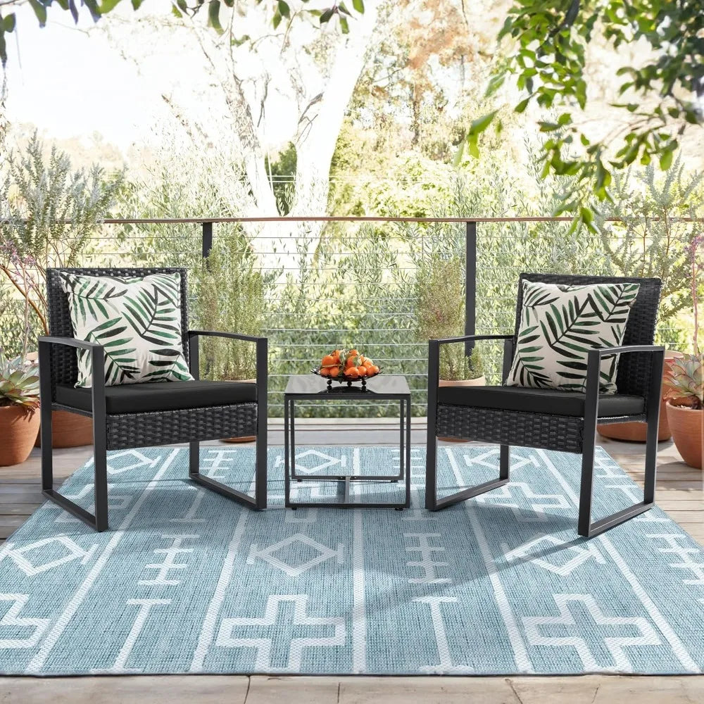 Outdoor Three Piece Wicker Patio Set With Glass Coffee Table